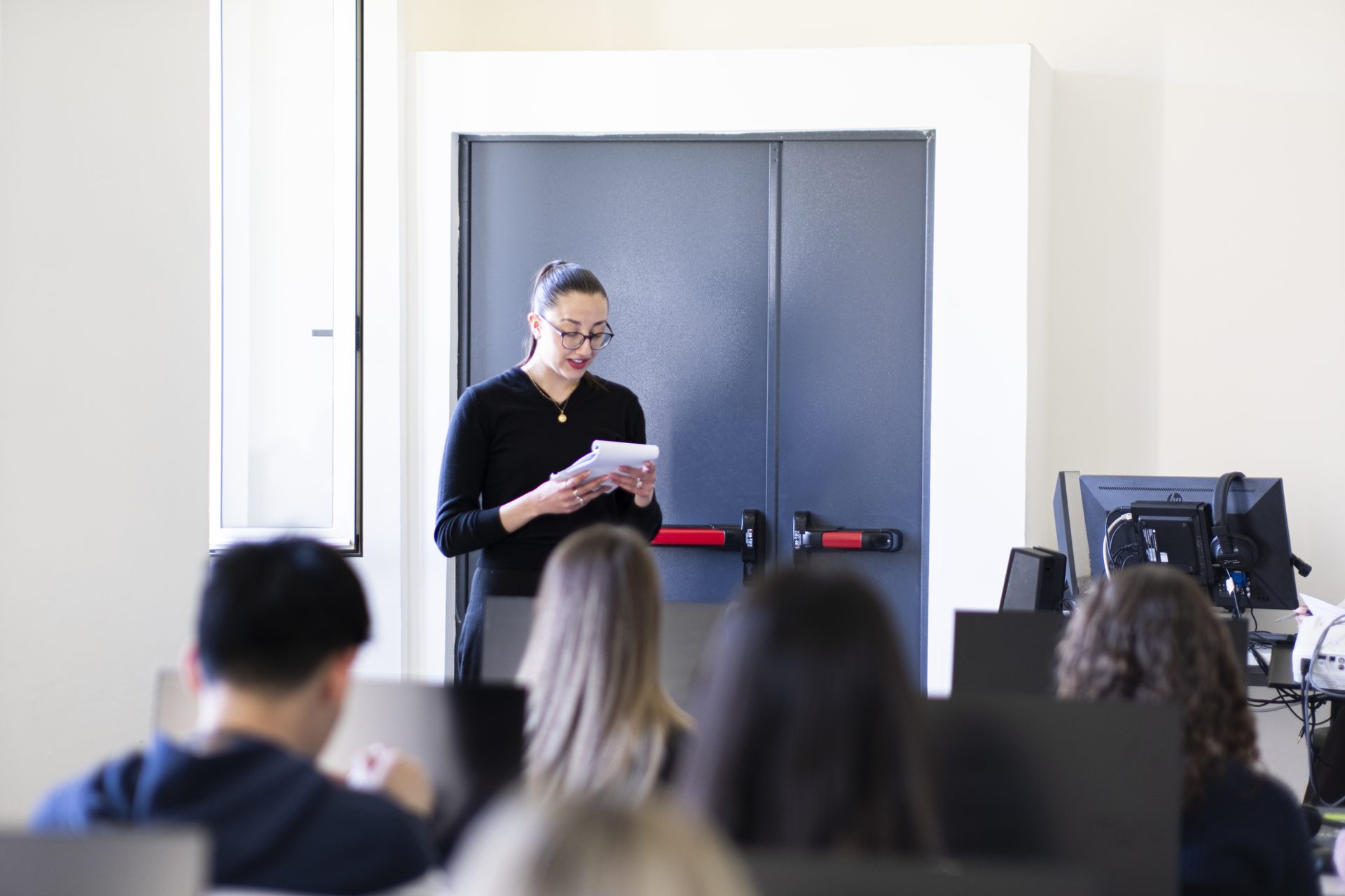 A student presenting her work to the class at Unicollege