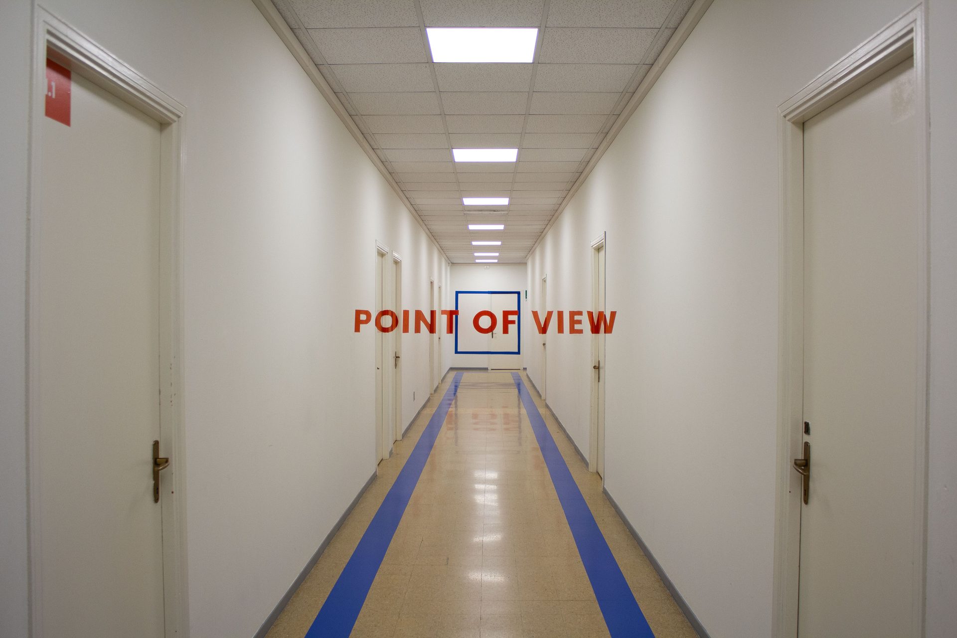 Corridor of the Unicollege Turin City College, lettered