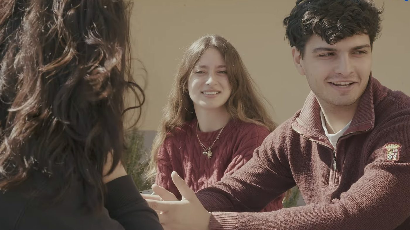 Two Unicollege students talking on campus