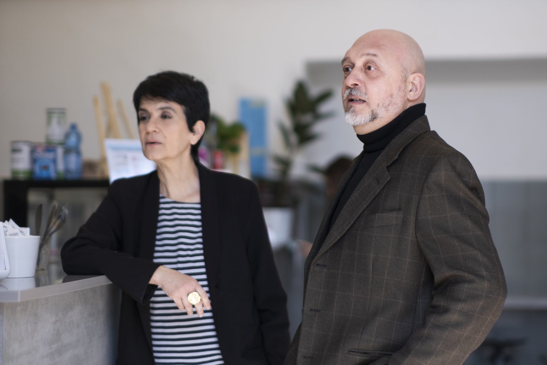 Two members of Unicollege staff in conversation on campus
