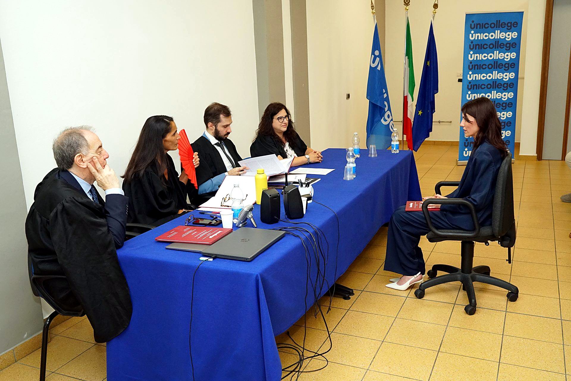 The examining board during a degree session at Unicollege