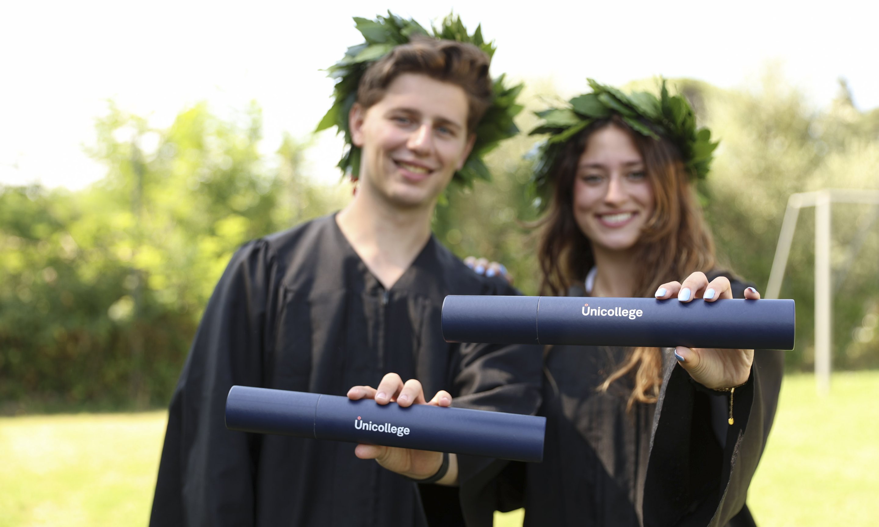 A graduation cap resting on a stack of books