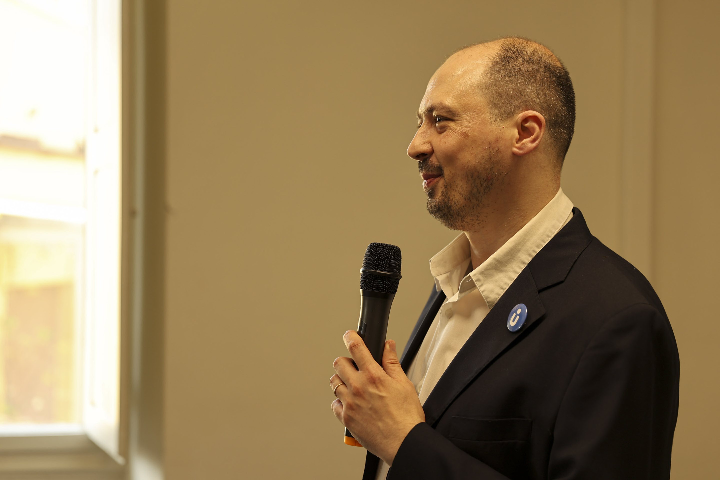 Speaker at a lectern during an international conference