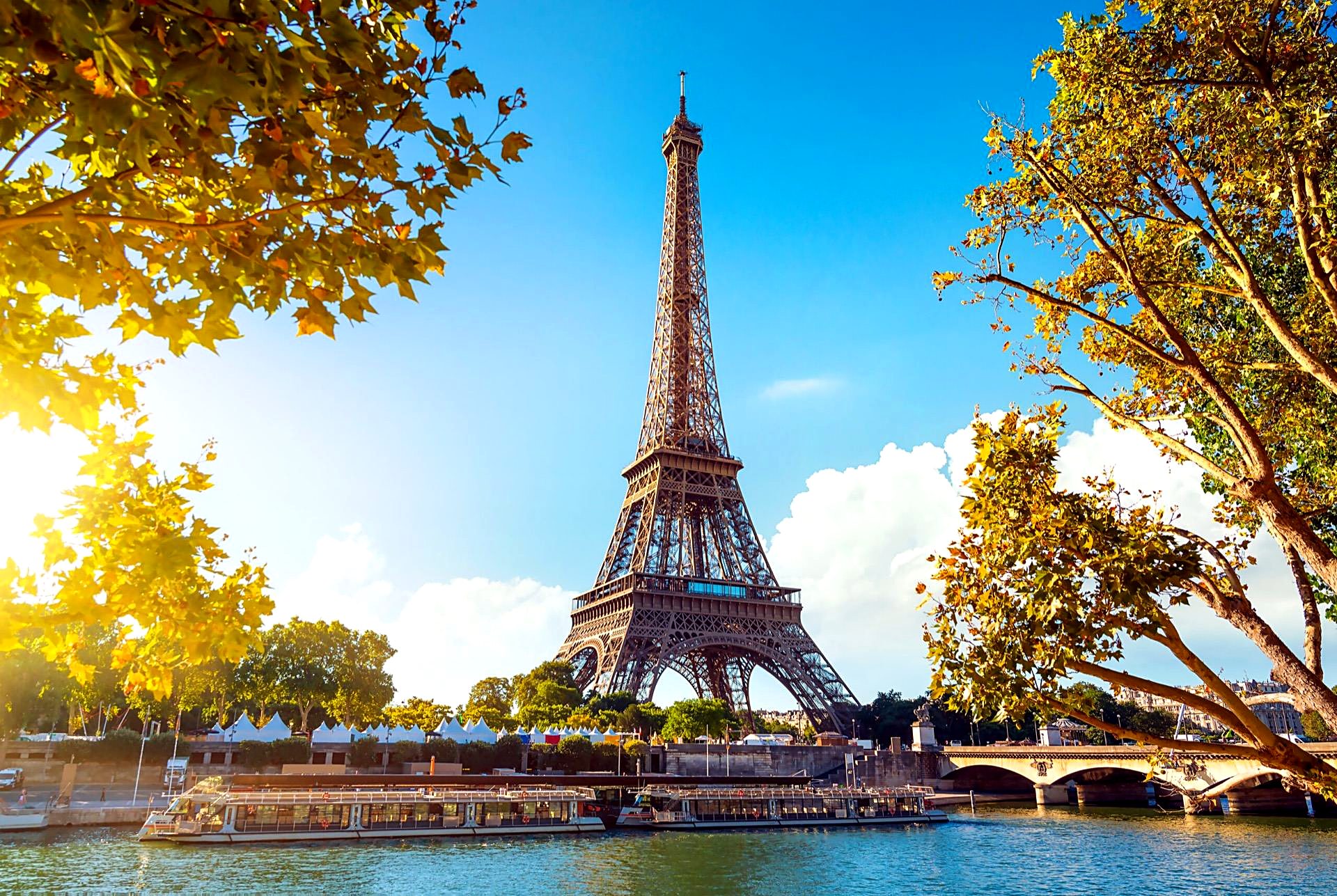 The Eiffel Tower in Paris seen from the banks of the Seine