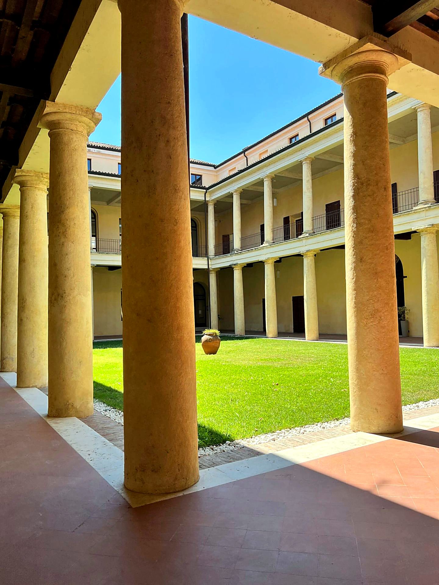 Colonnaded courtyard of the historic building that houses the Unicollege campus